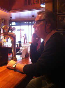 For Arts Sake owner, Brian Davis, talking business on the phone as we sip on a coffee waiting for Prezzo to open. 
